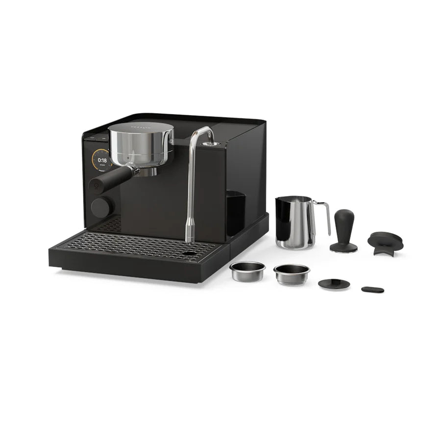 Black home espresso machine with accessories