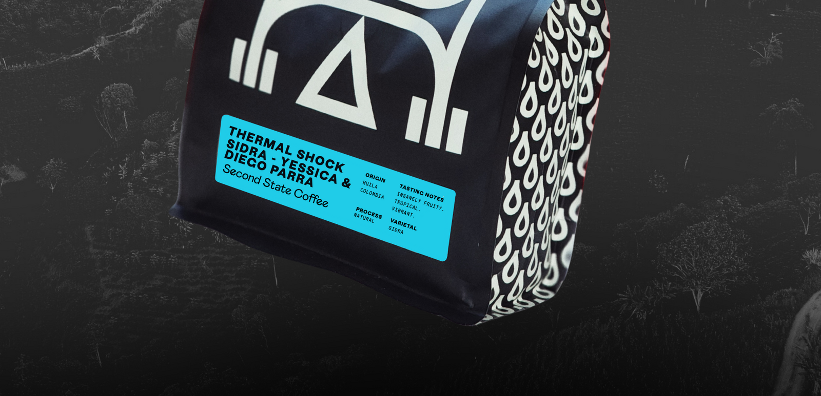 Coffee bag with brand logo and text on a dark background