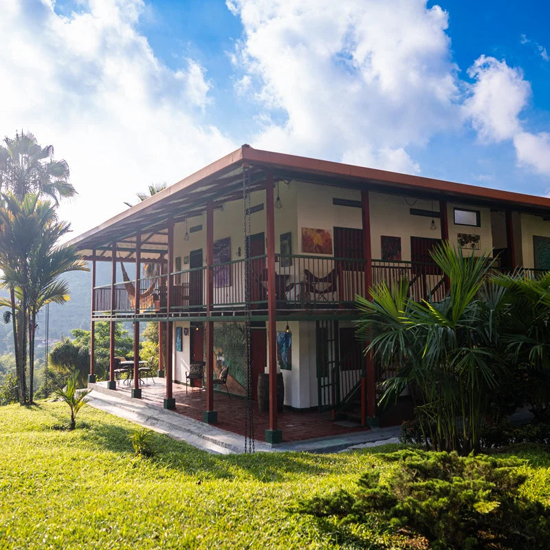 Two-story property with a balcony in Tolima Colombia at El Vergel coffee estate